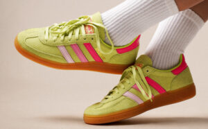 A Person wearing Adidas Womens Handball Spezial Shoes in Green Pink Color