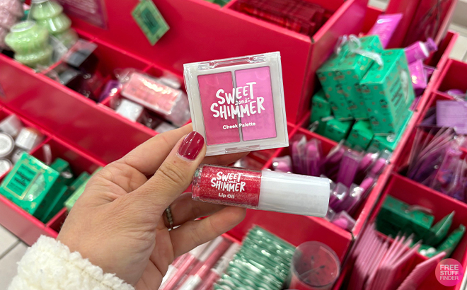 A Woman Holding Sweet and Shimmer Mini Products