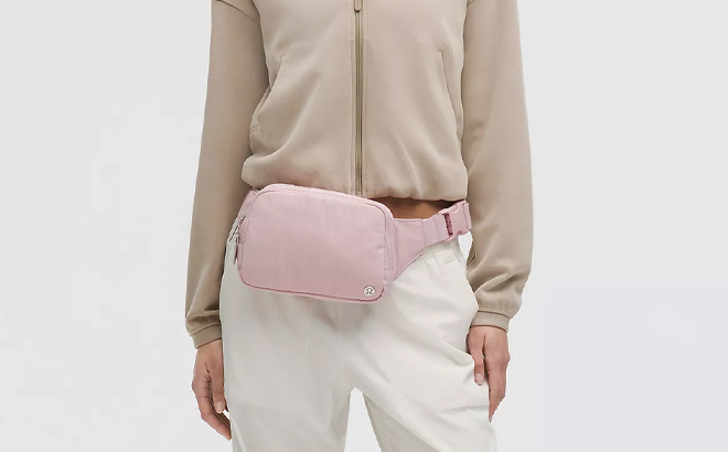 A Woman Wearing Lululemon Everywhere Belt Bag Large 2L A Woman Wearing Lululemon Everywhere Belt Bag Large 2L