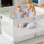 A Woman and Baby Playing in the Fodoss Small Playpen