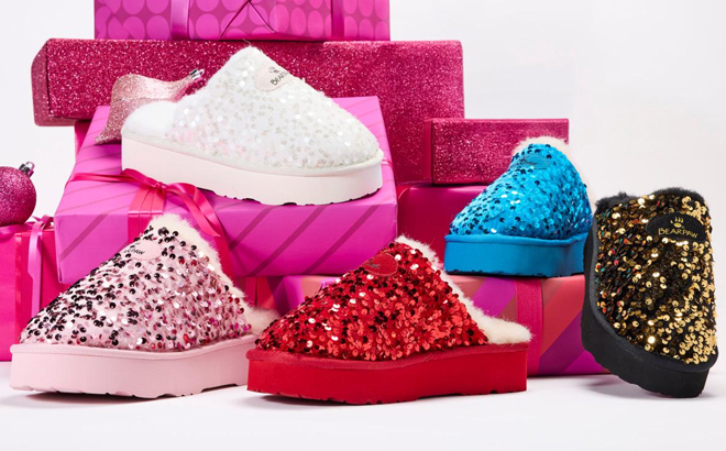 Bearpaw Portia Sequin and Suede Mule Slippers on a Product Stand