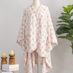 Berkshire Velvetsoft Wearable Plush Blanket in Blush Cane Color on a Mannequin