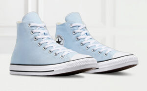 Converse CTAS HI Mens Shoes on the Table