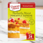 Duncan Hines Pineapple Supreme Flavored Cake Mix on a Kitchen Counter