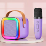 Feix G Mini Karaoke Machine Speaker and Mic on a Product Stand