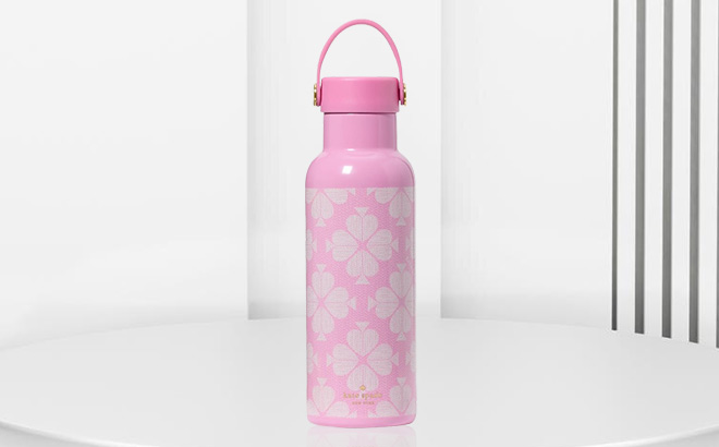 Kate Spade Outlet Signature Spade Water Bottle in Pink Color on the Table