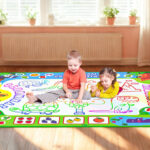 Kids Playing with Water Doodle Mat