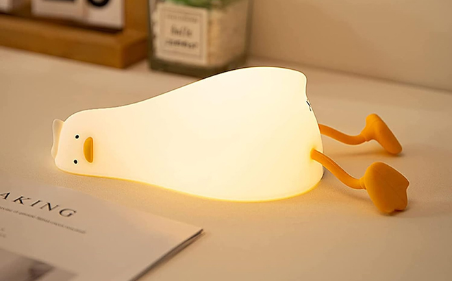 Lying Flat Duck Night Light on a Table