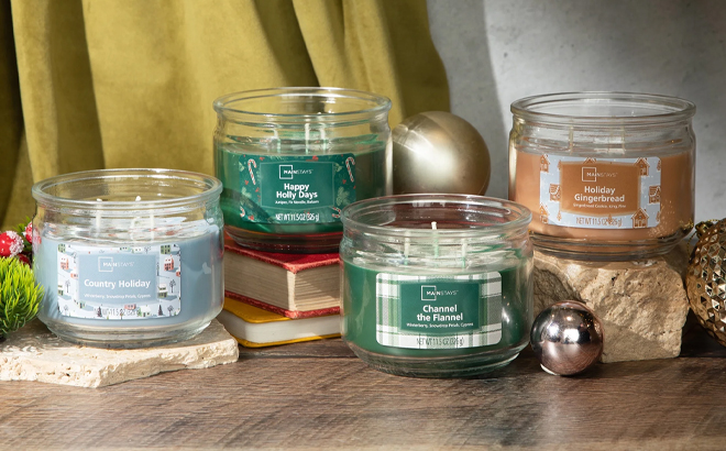 Mainstays 3 Wick Candles on a Table Mainstays 3 Wick Candles on a Table
