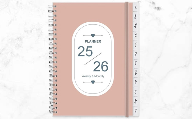 NOYARYJOUR Weekly Monthly Planner on a Marble Tabletop