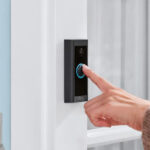 Person Using Ring Video Doorbell