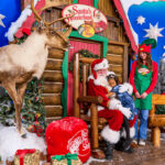 Santa Taking a Photo with Kids at Bass Pro Shops