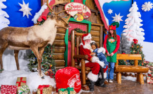 Santa Taking a Photo with Kids at Bass Pro Shops