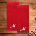 St Nicholas Square Monogram Towel 2 Piece Set on the Table