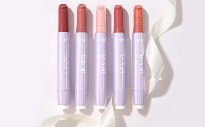 Tarte Maracuja Juicy Lip Vinyl 5 piece Gift Set on the Light Purple Table