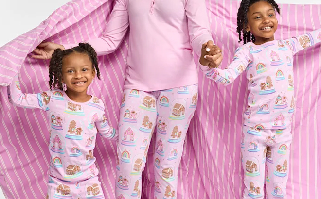 Two Girls Wearing The Childrens Place Gingerbread Snow Globe Snug Fit Cotton Pajamas