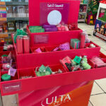 Various Sweet and Shimmer Products in a Product Stand at ULTA Store
