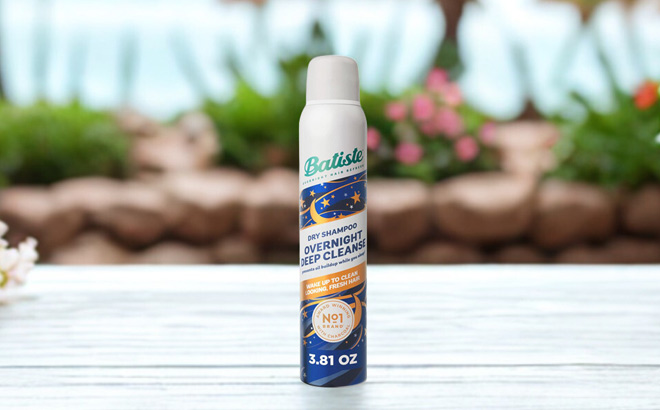 A Bottle of Batiste Overnight Deep Cleanse Dry Shampoo on a Table