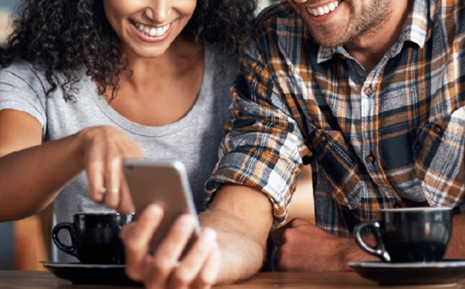 A Couple Using Origin Financial App A Couple Using Origin Financial App