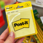 A Person Holding Post It Notes