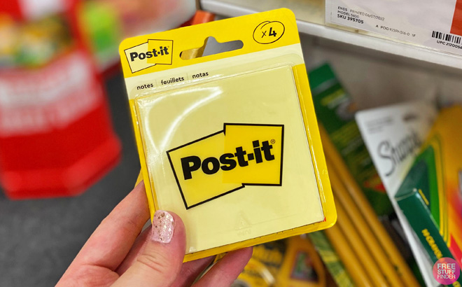 A Person Holding Post It Notes