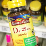 A Person Holding a Bottle of Nature Made Vitamin D3 Supplement