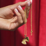 A Person Holding a Necklace