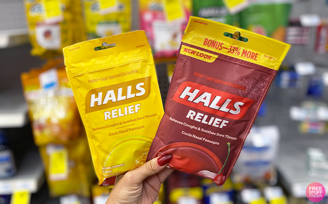 A Person Holding the Halls Relief Cough Drops at CVS
