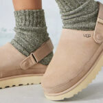 A Person Wearing UGG Goldenstar Clog