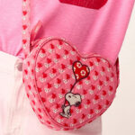 A Person wearing Vera Bradley Peanuts Verona Heart Crossbody