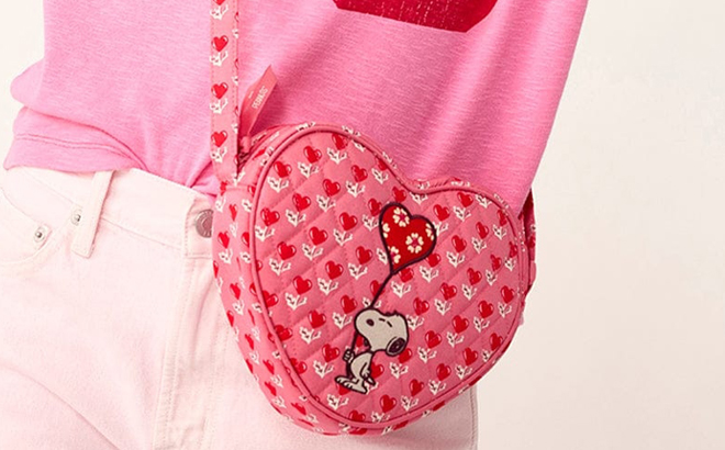 A Person wearing Vera Bradley Peanuts Verona Heart Crossbody