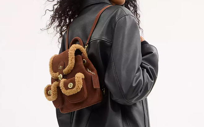 A Woman Wearing Coach Outlet Hadley Mini Backpack A Woman Wearing Coach Outlet Hadley Mini Backpack