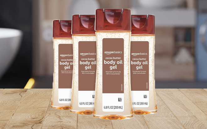 Amazon Basics Body Oil Gel with Cocoa Butter 4 Pack on a Bathroom Counter