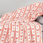 Berkshire Oversized Holiday Throw on a Sofa