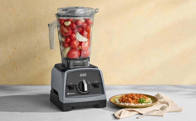 Blender next to a Plate of Food