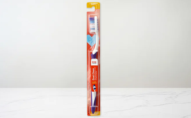 CVS Dual Clean Toothbrush on a Marble Tabletop
