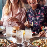 Friends Eating at a Local Restaurant
