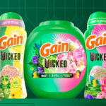 Gain x Wicked Laundry Scent Boosters and Detergent Pacs on a Washing Machine