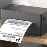 Pedoolo Label Printer on the Table