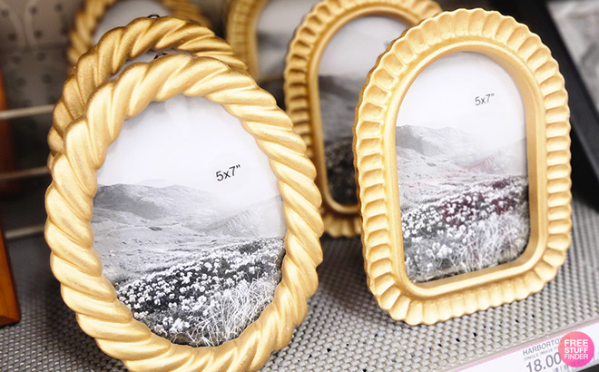 Two Photo Frames on Shelf