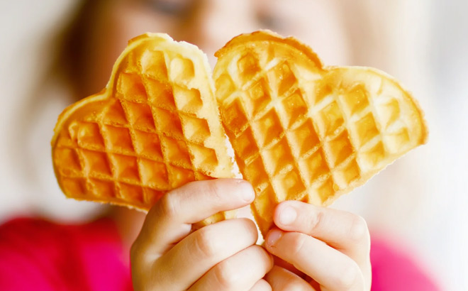 A Kid Holding Two Mini Heart Waffles