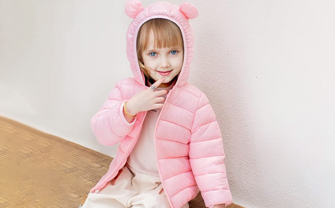 A Kid Wearing Puffer Jacket in Pink Color