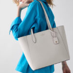 A Person Holding Kate Spade Outlet Dana Tote Bag