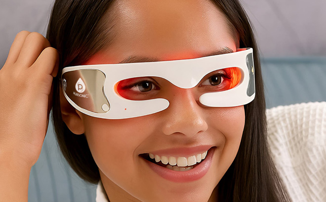 A Person Using a Pursonic LED Light Therapy Advanced Restoration Eye Mask A Person Using a Pursonic LED Light Therapy Advanced Restoration Eye Mask