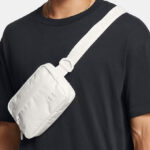 A Person Wearing Under Armour Essential Waist Bag Crossbody