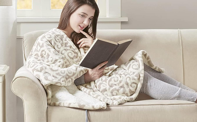 A Person Wearing the Beautyrest Wearable Electric Poncho Wrap Blanket