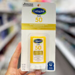 A Person holding Cetaphil SPF 50 Sheer Mineral Sunscreen Stick