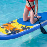 A Person on a FunWater Inflatable Paddle Board
