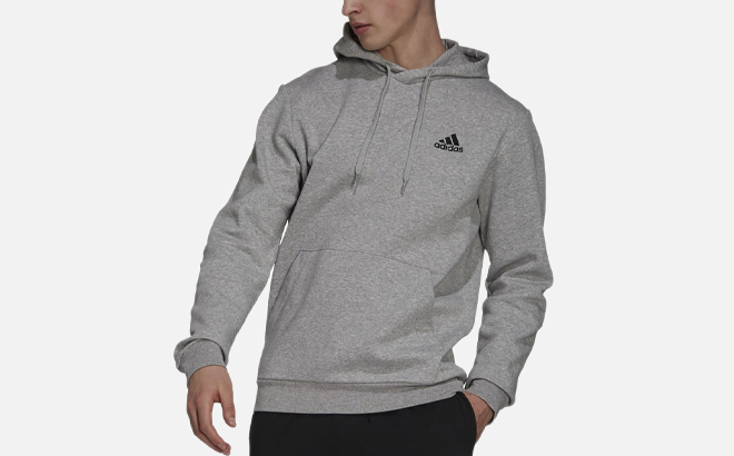 A Person wearing Adidas Mens Fleece Hoodie