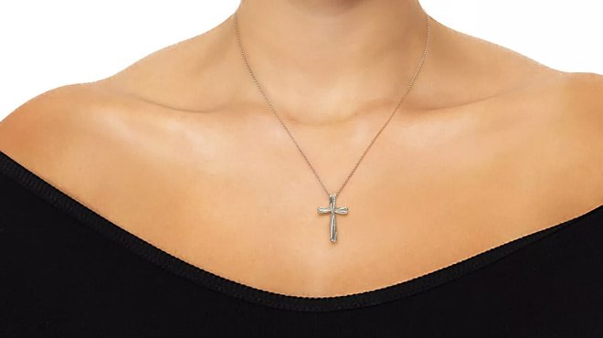 A Woman Wearing Forever Radiant Diamond Accent Cross Pendant Necklace